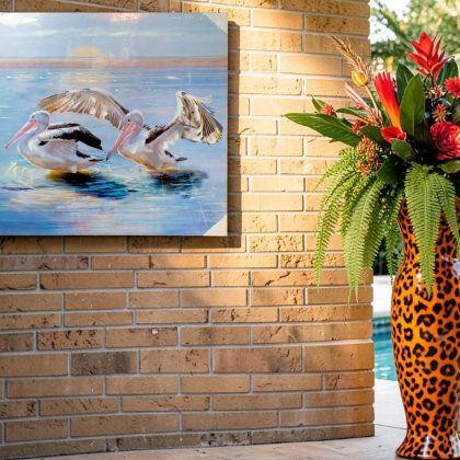 Swimming Pelicans Beach Canvas Print