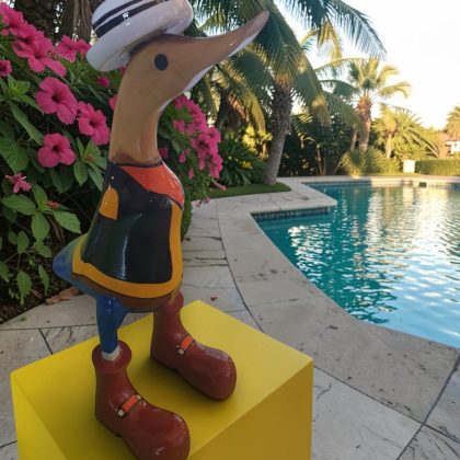 Carved Wooden Cowboy Duck Statue